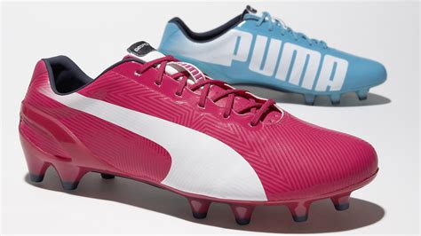 brand new puma pink cleats.